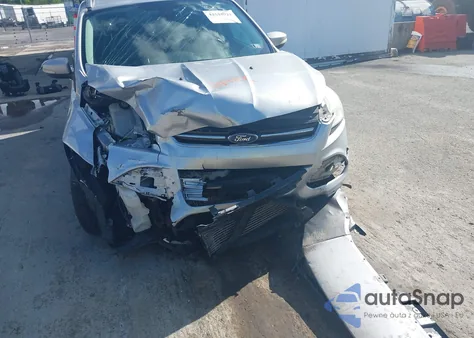 2014 Ford Escape Titanium z USA, uszkodzony, nr VIN 1FMCU9J92EUA53779